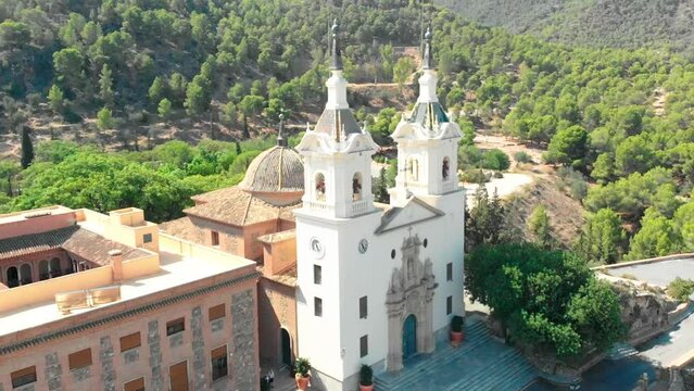 Aerial drone view revealing the Catholic Church Sanctuary of Virgen de la Fuensanta in Murcia, south Spain. Tilting shoot.