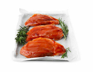 Raw marinated meat and rosemary isolated on white