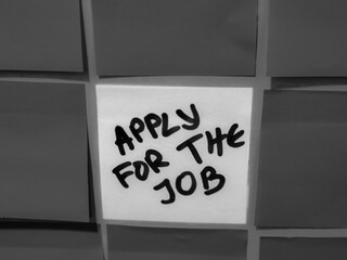 Career Shift.  Sticky Notes Surrounding a white center Note with Job Application Text. Monochrome detail.