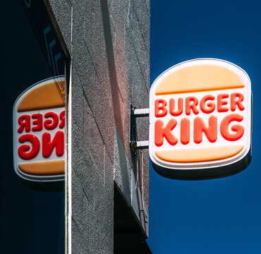 Burger King Signage Illuminated Against a Clear Blue Sky