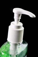 Fototapeta na wymiar Disinfectant gel in a ready use bottle for antibacterial hand washing 