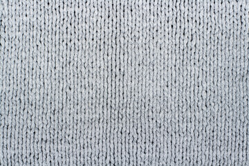 Sweater or scarf fabric texture large knitting. Knitted jersey background with a relief pattern. Wool hand- machine, handmade. - 786572823