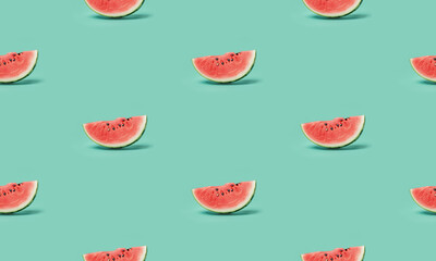 Colorful fruit seamless pattern of fresh watermelon slices on bright green background. Flat lay summer background.