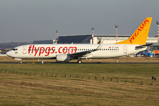 Dusseldorf, Germany - January 15, 2012: Turkish Pegasus Boeing 737-800 with registration TC-AAH on taxiway at Dusseldorf Airport