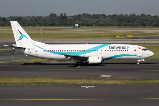 Dusseldorf, Germany - September 8, 2012: Turkish Tailwind Airlines Boeing 737-400 with registration TC-TLA on taxiway at Dusseldorf Airport