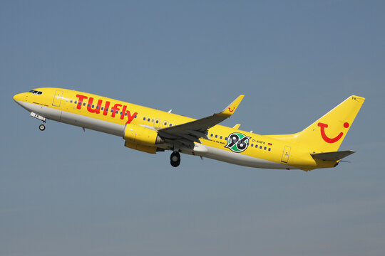 Dusseldorf, Germany - September 3, 2011: German TUIfly Boeing 737-800 with registration D-AHFK with Hannover 96 sticker just airborne at Dusseldorf Airport