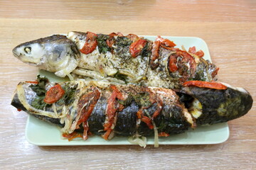 Table in a restaurant with a variety of
  snacks and food.