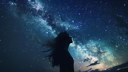 Fotobehang Silhouette of a woman in the magnificent Milky Way Galaxy, which lights up the night sky with countless stars.無数の星で夜空を照らす壮大な天の川銀河に女性のシルエット、Generative AI © lime