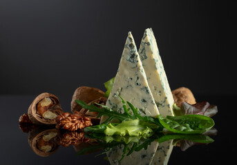 Blue cheese with walnuts and fresh greens.