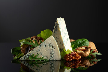 Blue cheese with walnuts and fresh greens. - 786592298