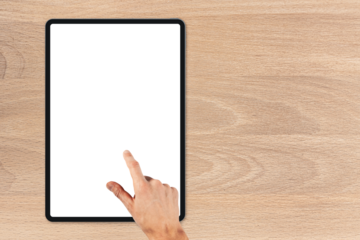 the tablet is on the wood table