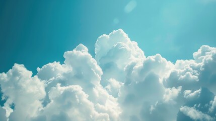 A plane soaring through fluffy clouds, suitable for travel and aviation concepts - obrazy, fototapety, plakaty