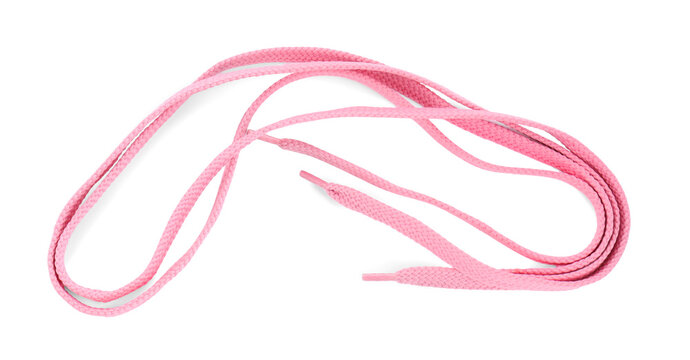 Stylish pink shoe laces isolated on white, top view