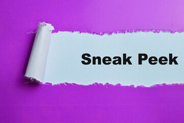 Concept of Sneak Peek Text written in torn paper.
