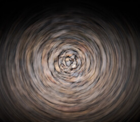 A mesmerizing whirlwind of stones forms a textured ground