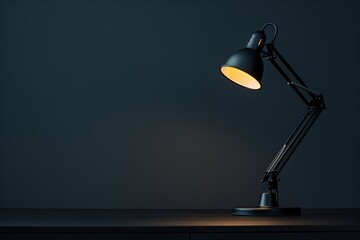 Modern table lamp with light on dark background