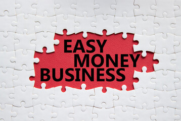 Easy Money Business symbol. Concept words Easy Money Business on white puzzle. Beautiful red...