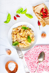 boiled pasta with minced meat and basil