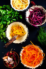 grated color carrot in bowls, raw carrot - 786631037