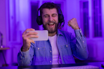 Gamer celebrating with a selfie at home