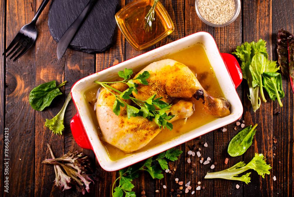 Canvas Prints cooked legs of chicken with spinach on plate. balanced meal.