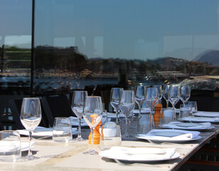 Served table for banquet in restaurant with glasses and plates