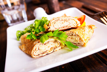 Dashimaki tamago, Japanese style rolled omelette in dish on wooden table - 786641693