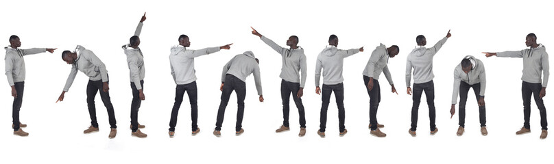 group of same man pointing fingers everywhere on white background - 786644247