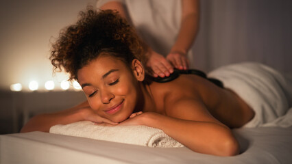 Calming night spa massage experience for a lady