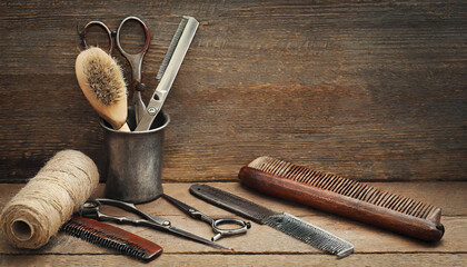 Vintage tools of barber shop on wooden background - Powered by Adobe
