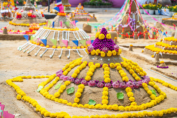 Thai people come to build the Sand Pagoda for return the sand to the temple on Songran festival at...