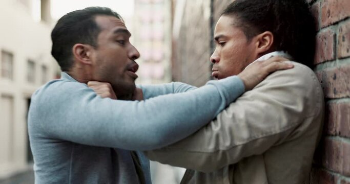 City, men and street fight with violence, battle and disagreement with wall, aggression and pushing. Argument, bullying and angry friends in brawl in urban alley with danger, conflict and frustrated