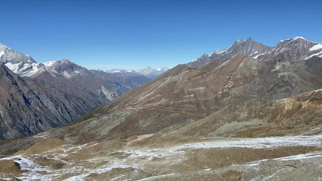 The snowy peaks of Switzerland. Mount Zermat in the sunlight from the observation deck.