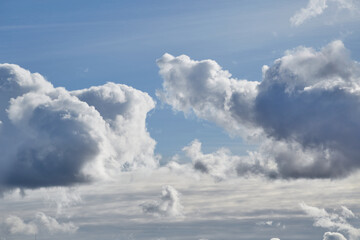 Fototapeta premium Cumulus clouds cover the sky
