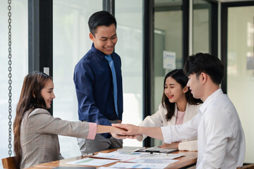 Business people putting their hands together. Stack of hands. Unity and teamwork concept
