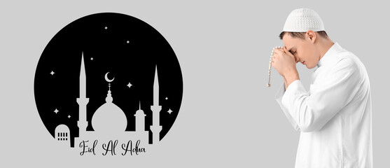 Young Muslim man with praying beads on light background. Ramadan celebration