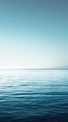 Tranquil ocean surface with gradient blue hues.