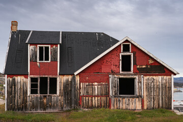 Red house abandoned photographed in Greenland close to Ilulissat