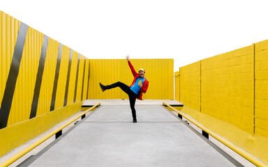 Joyful Dance Move in Vibrant Yellow Surroundings