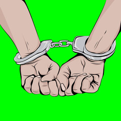 Man's hands with handcuffs.