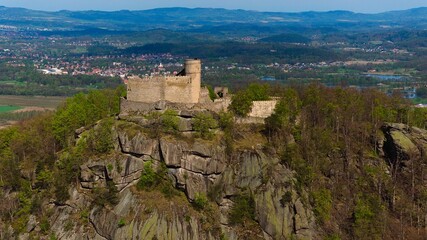 Fototapeta na wymiar Medieval Chojnik Castle atop Karkonosze mountain in aerial shot.