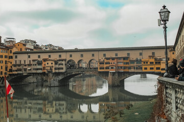 Obraz premium ponte vecchio and arno in florence 