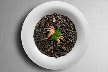 Dish of risotto with squid ink