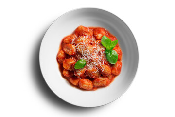 White bowl with tomato potato gnocchi
