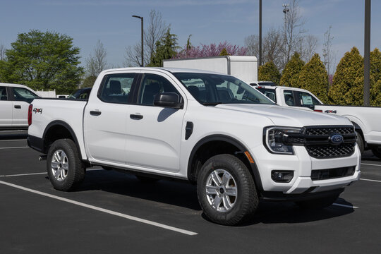 Ford Ranger STX 4X4 display at a dealership. Ford offers the Ranger in XL, XLT, Lariat and Raptor models.