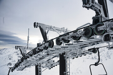 frozen chairlifts in the mountains