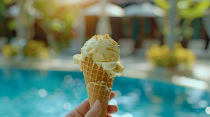 Woman enjoying banana ice cream in waffle cone by hotel pool, a sweet summer treat