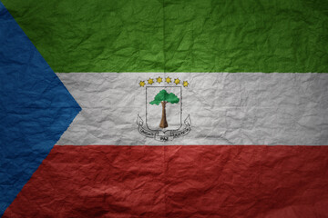 big national flag of equatorial guinea on a grunge old paper texture background
