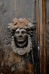 Wooden sculpture on the door