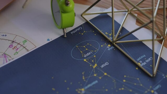 Close-up. Star charts for calculations and drawing up a natal chart, a modern attribute of any professional astrologer